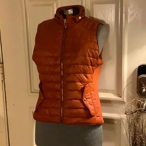 Retro style and color to this modern puffer vest